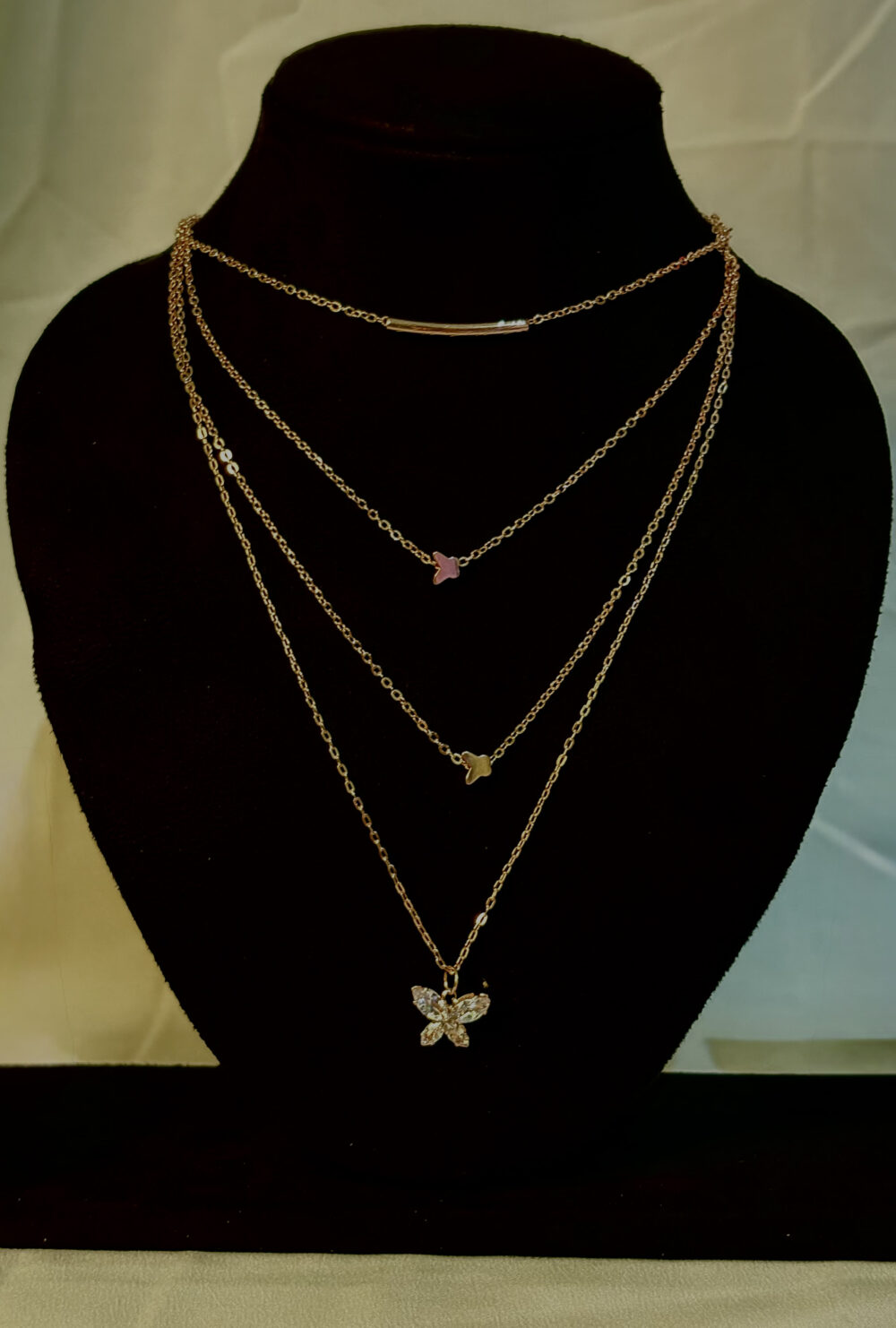 Layered necklaces with butterfly pendant 